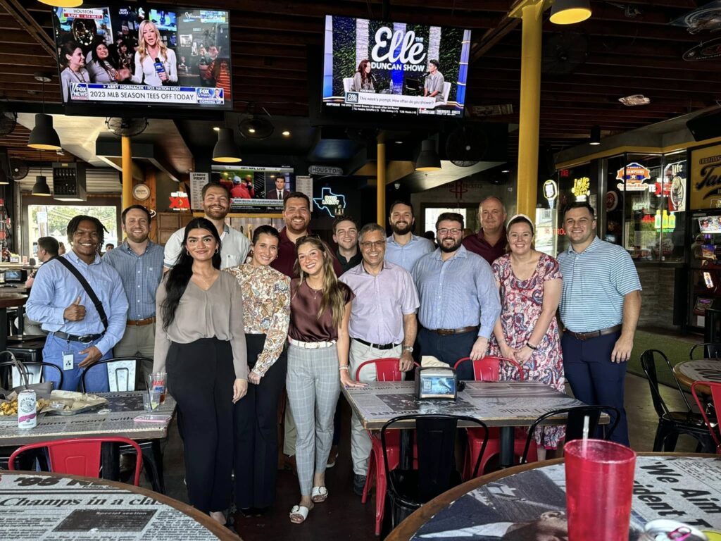 14 people in attendance at an Aggie Planner Happy Hour in Houston